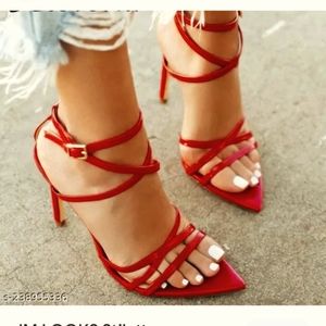 Gently used size 6, red stiletto (runs small)